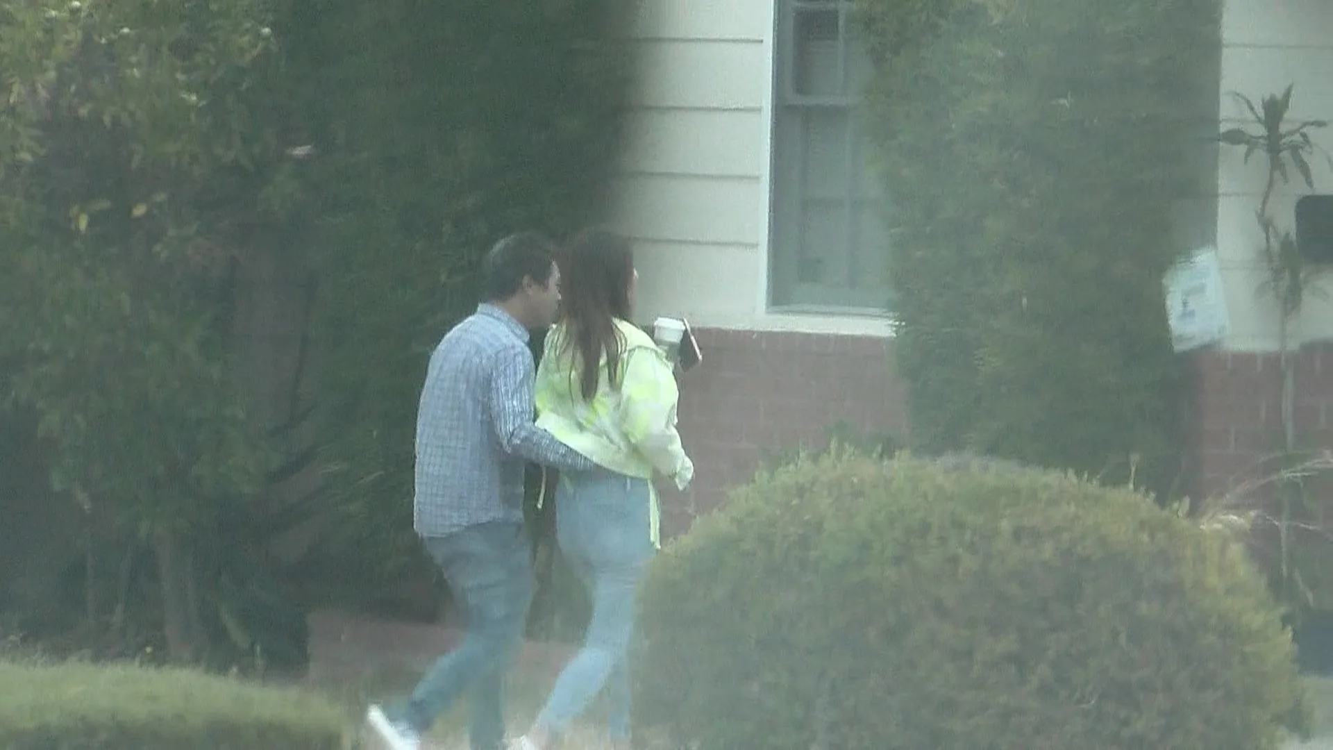 Private investigator documenting a suspected cheating husband meeting with another woman in Santa Monica.