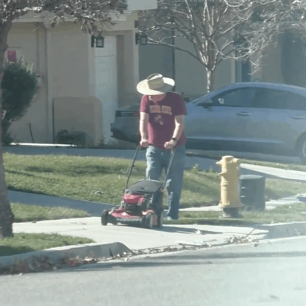 Claimant mowing the lawn during workers comp surveillance investigation